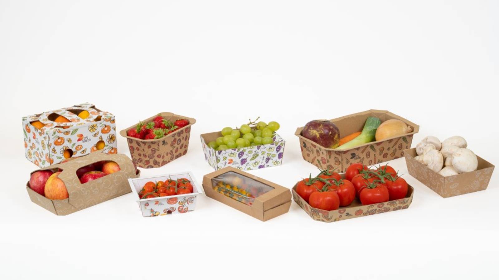 Collection of cardboard baskets and trays designed for fresh produce packaging, shown with assorted fruits and vegetables