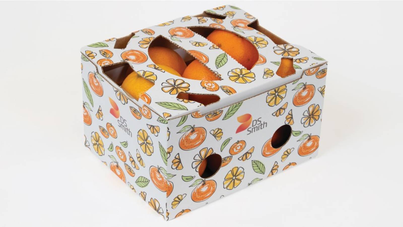 DS Smith corrugated cardboard carry box filled with oranges, featuring a colorful citrus-themed print and integrated handle for fresh produce packaging.