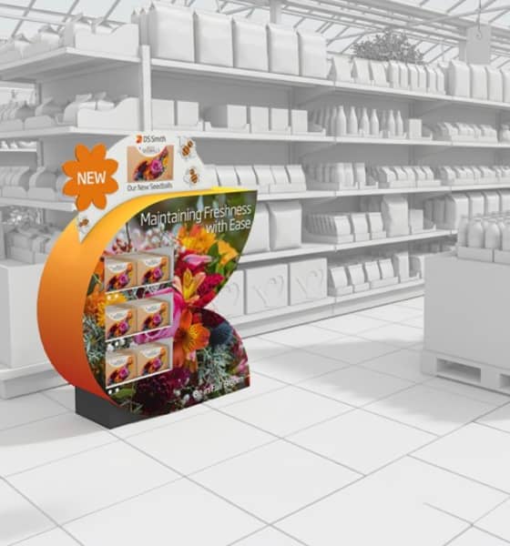 DS Smith Seedbals promotional display in a garden centre, showcasing flower care products with vibrant floral graphics.