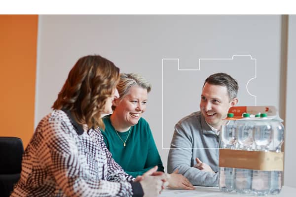 Colleagues discussing on a table