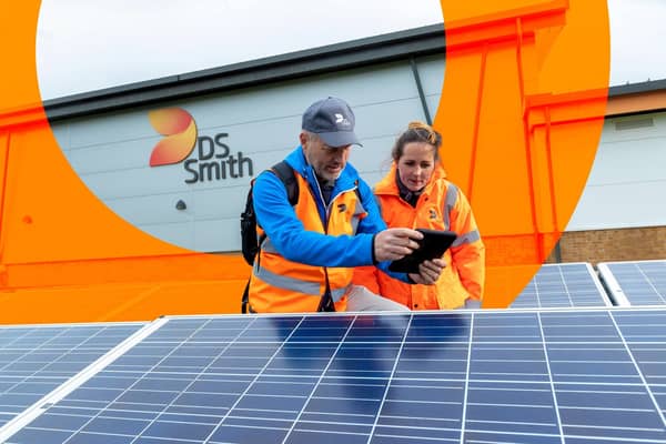 DS Smith employees at work in a photovoltaic installation.