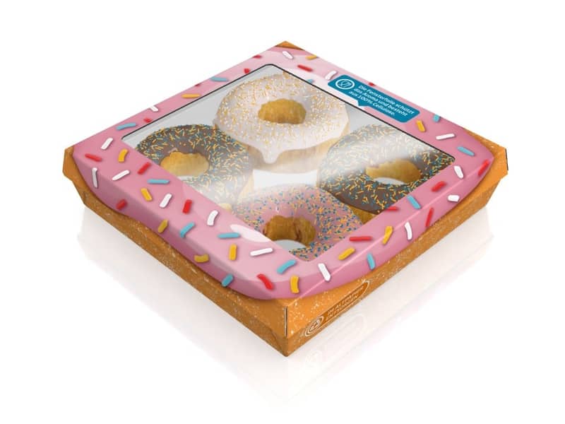 Faserbasierte Lebensmittelverpackung gefüllt mit vier Donuts.