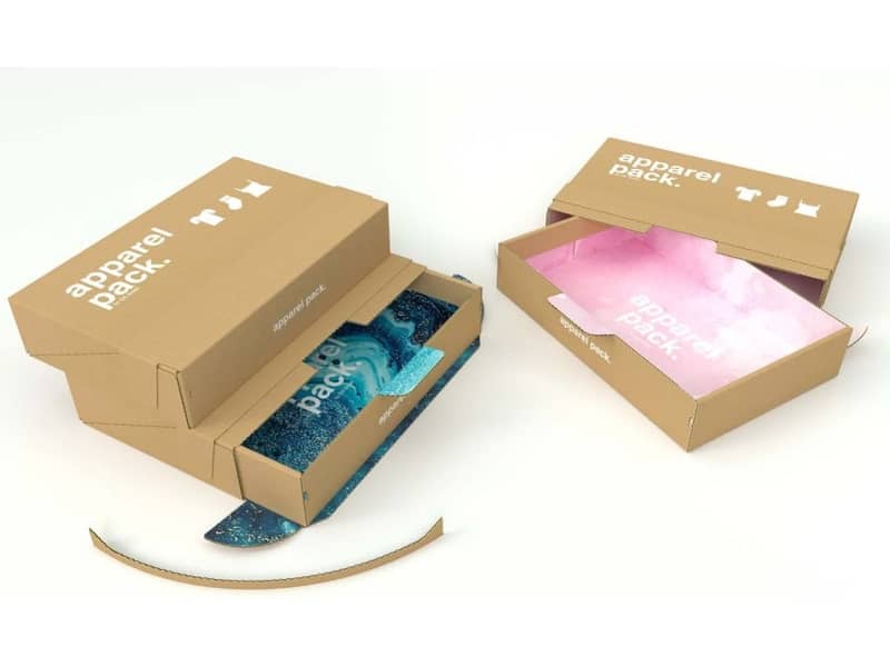 Zwei geöffnete Versandverpackungen aus Wellpappe mit einem blauen und einem rosa Innendruck.