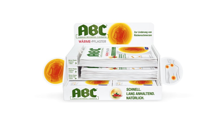 Befülltes Thekendisplay von ABC Wärmepflaster.