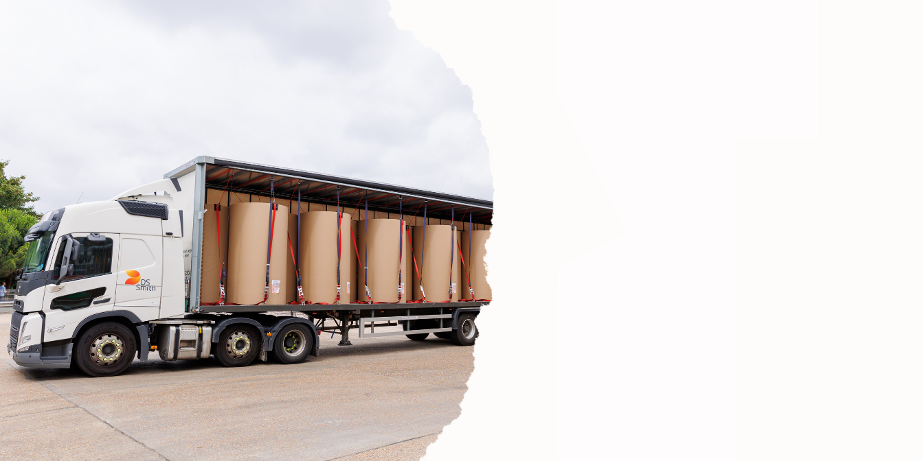 a lorry loaded with paper reels