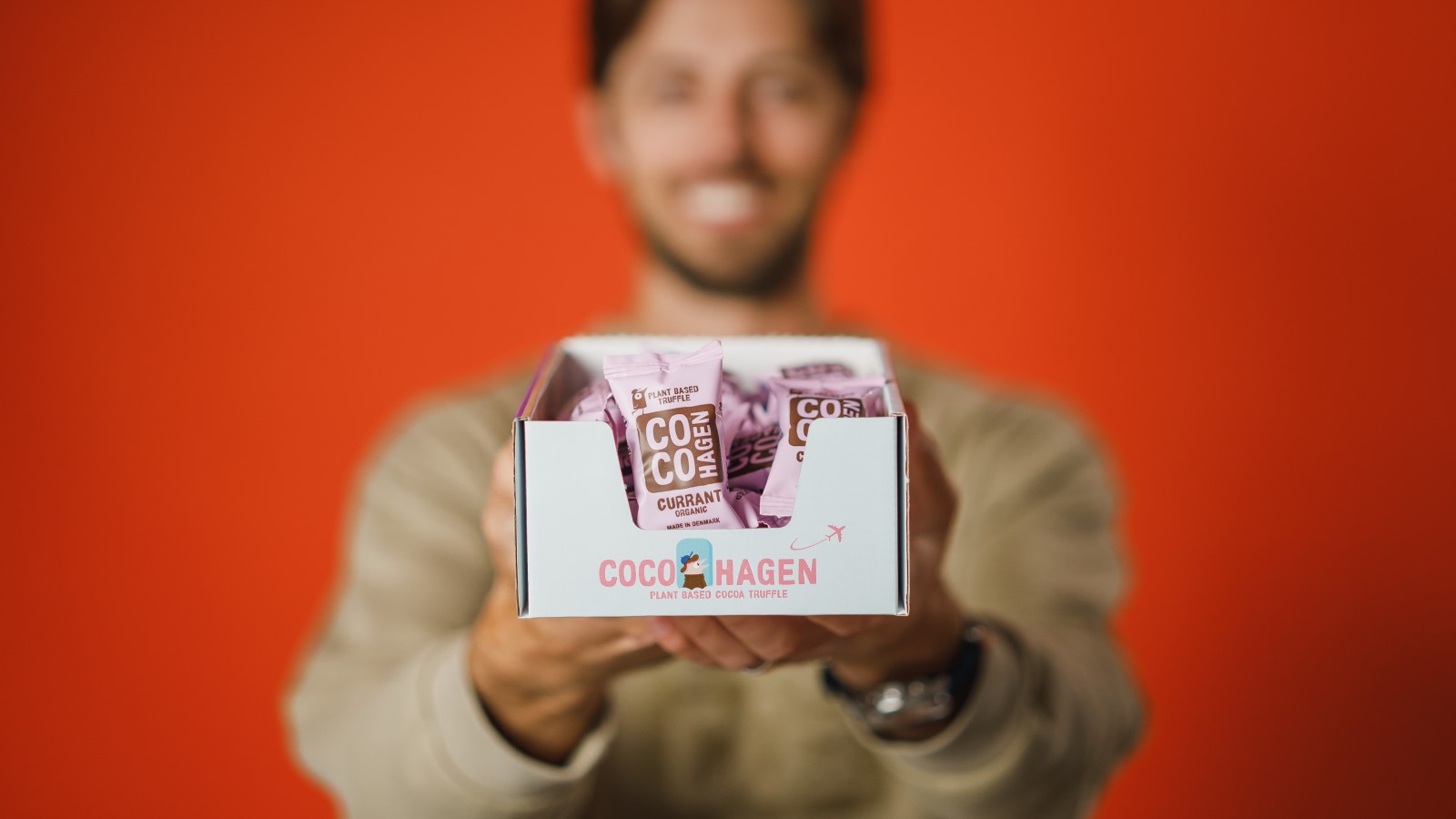 Cocohagen Packaging in front of a blurred man
