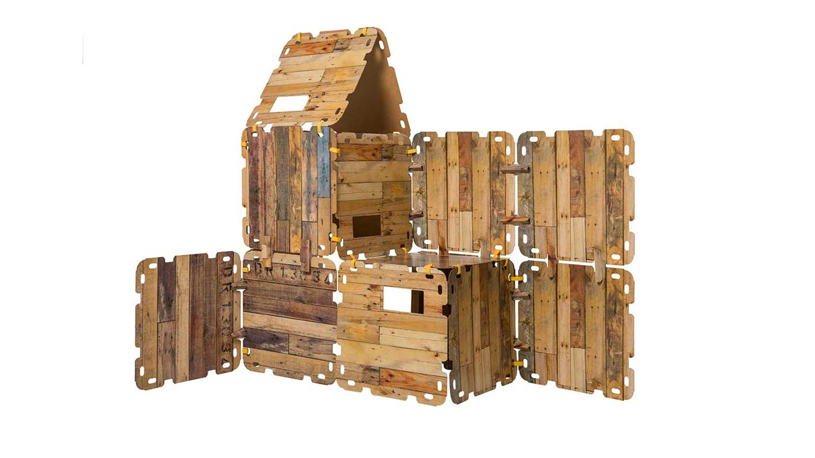 Golfkartonnen bouwset voor kinderen met houtbedrukking in de vorm van een huis of kasteel.