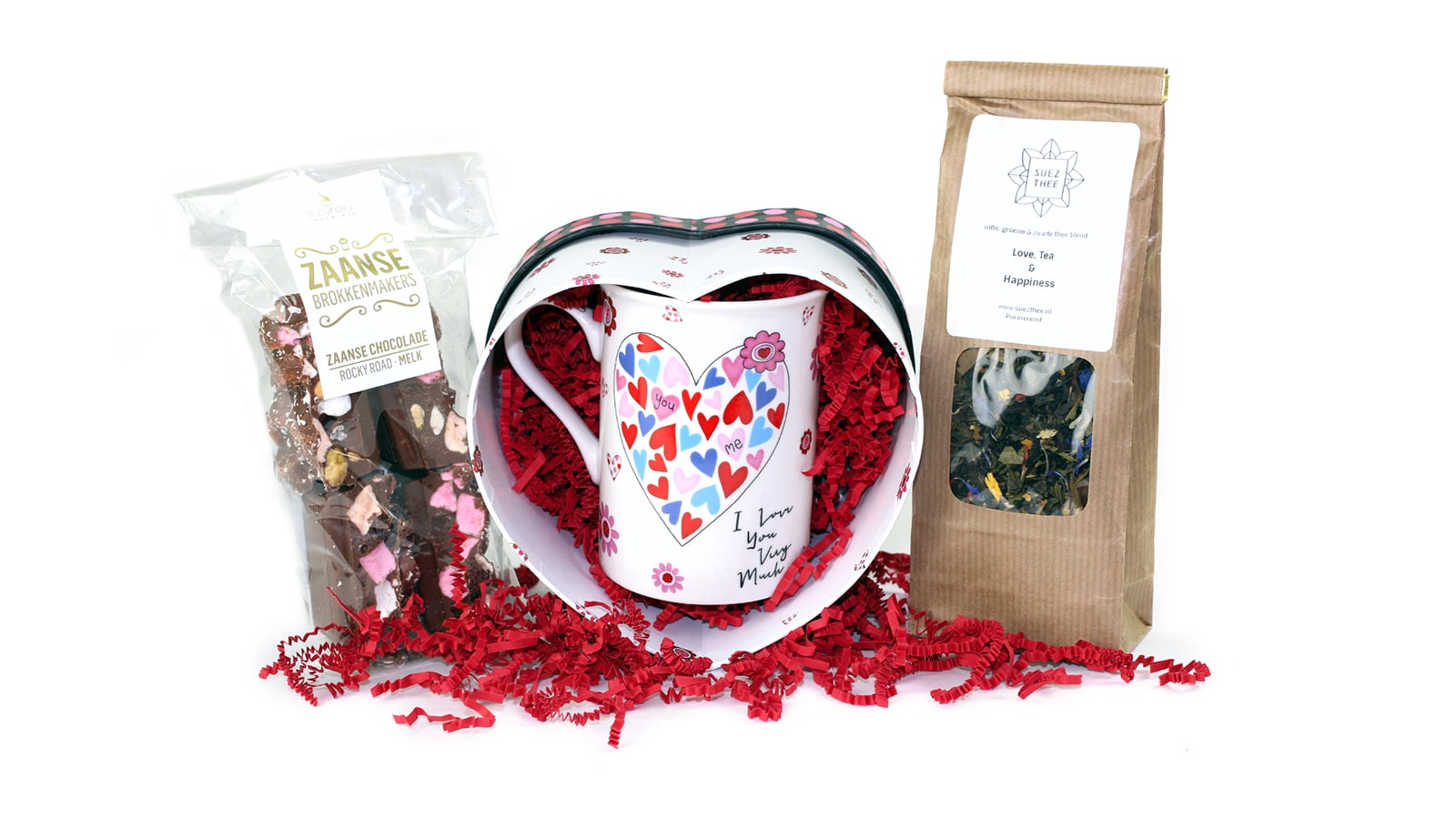 Thee geschenkverpakking van Suez met rode SizzlePak decoratie