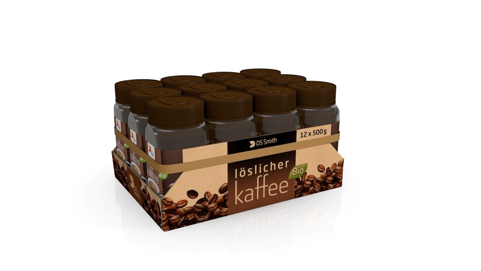 12 Dosen gefüllt mit löslichem Kaffee sind durch einen bedruckten Wellpappzuschnitt und eine braune Banderole gebündelt. 
