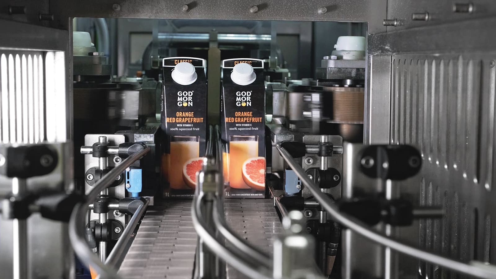 Vruchtensappen in verpakkingsmachine