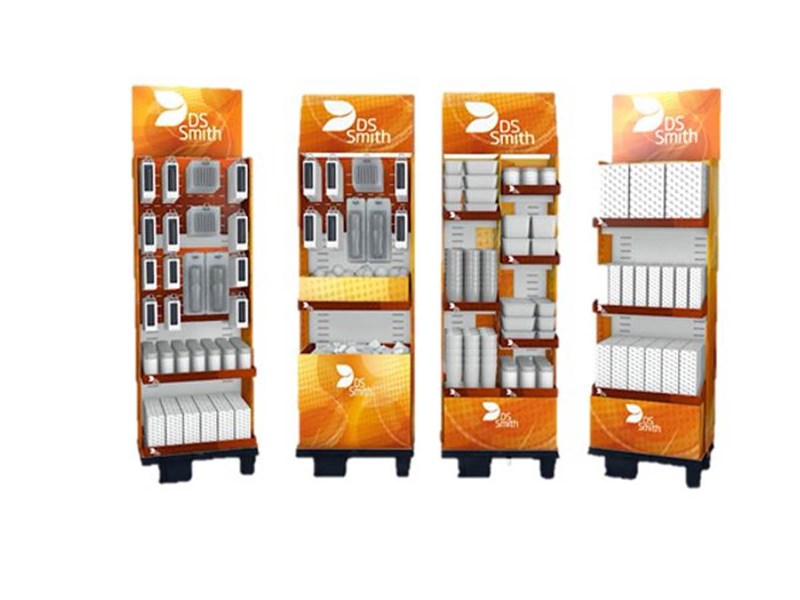 vier kartonnen oranje POS displays